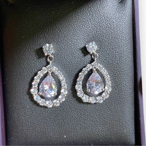 Diamond tear drop earrings.